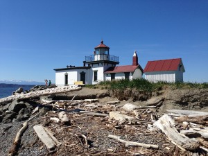 The West Point Lighthouse in Discovery Park basks in the sunshine on Sunday. Sunny weather propelled the temperature to 84 degrees at both Sea-Tac Airport and Boeing Field.